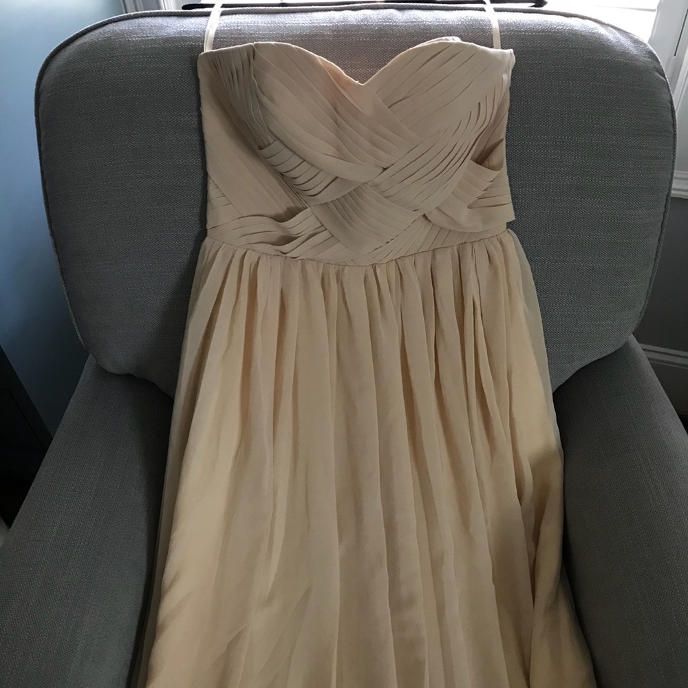 Long chiffon party gown with detachable straps.